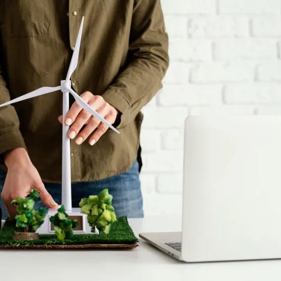 Woman working on scale turbine model