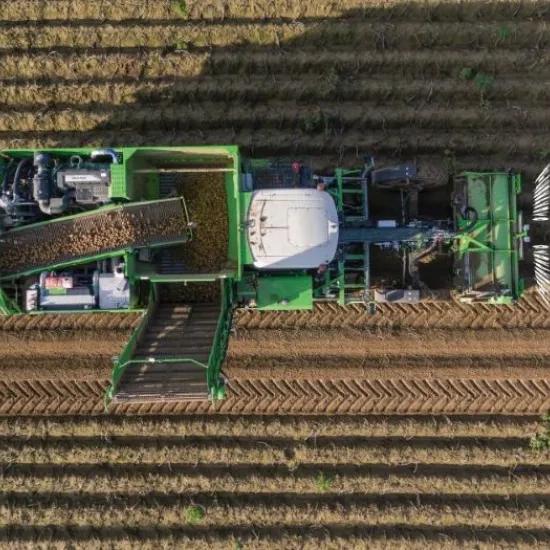 AVR smart and transparent potato harvesting machine at work at the field