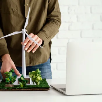 Woman working on scale turbine model