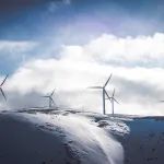 Wind turbine in snowy landscape