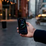 Man holds smartphone in hand